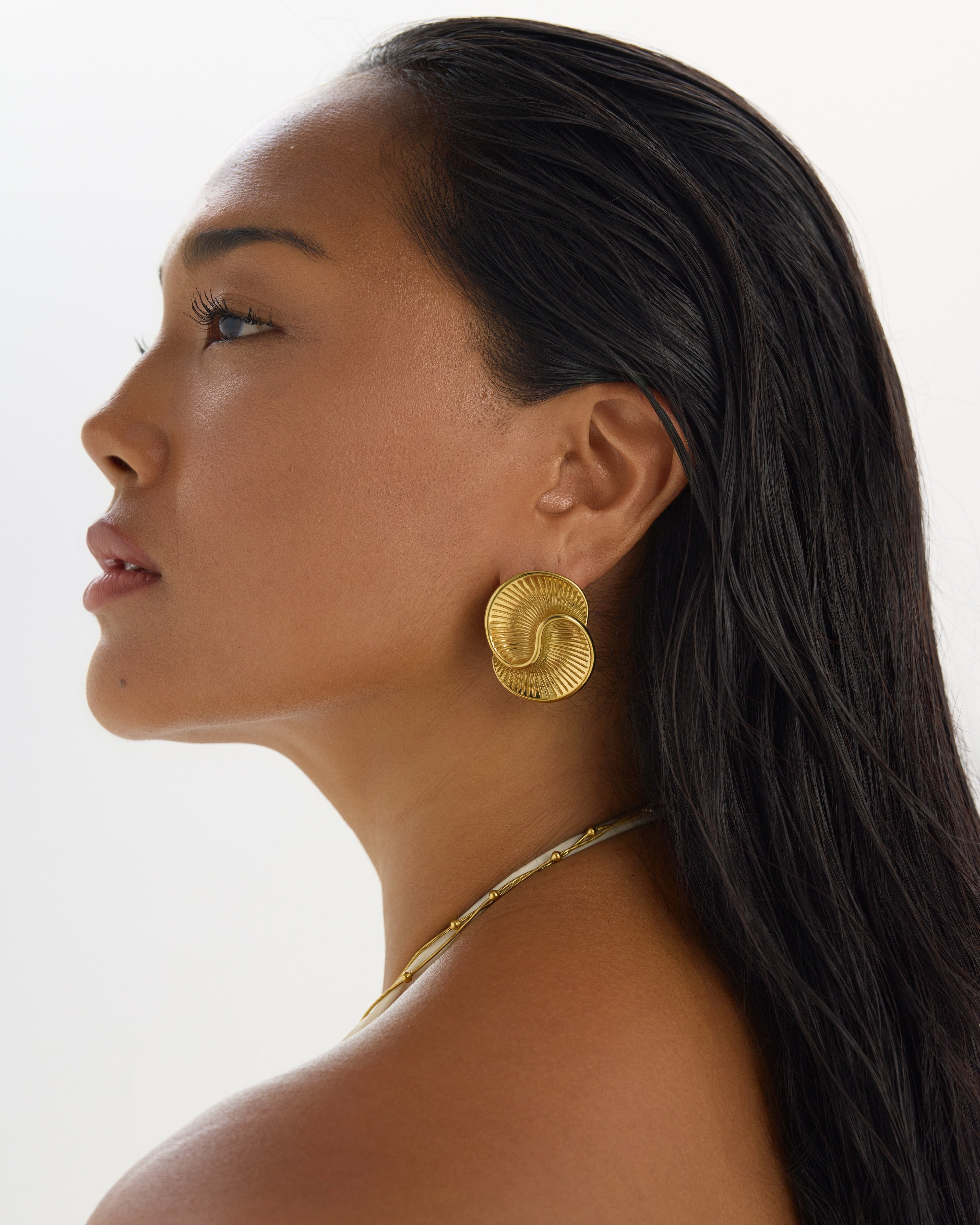 Chunky textured 18K gold-plated stud earrings with spiral line detailing