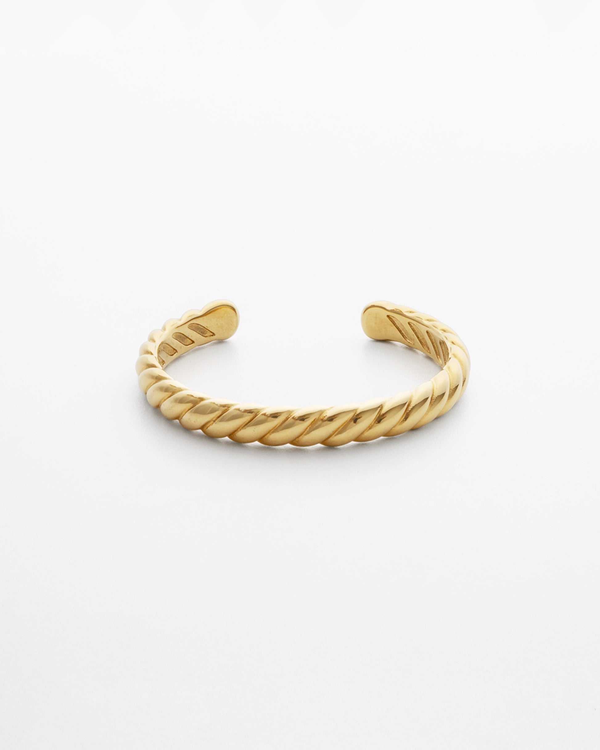 Chunky statement 18K gold-plated croissant bangle with twisted detailing