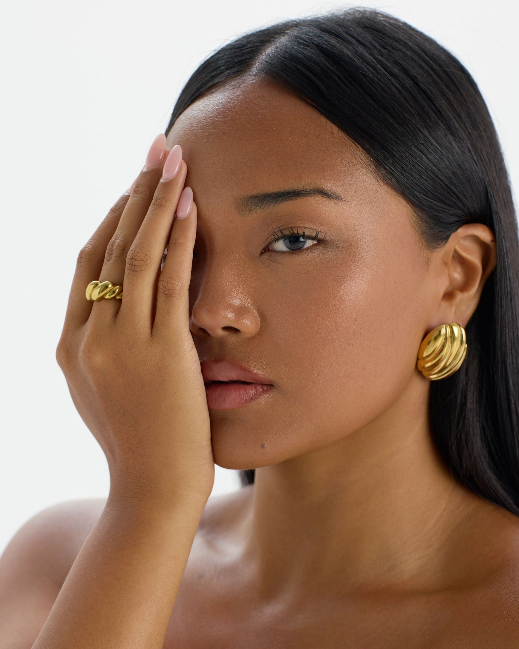 Chunky statement 18K gold-plated croissant ring with twisted detailing