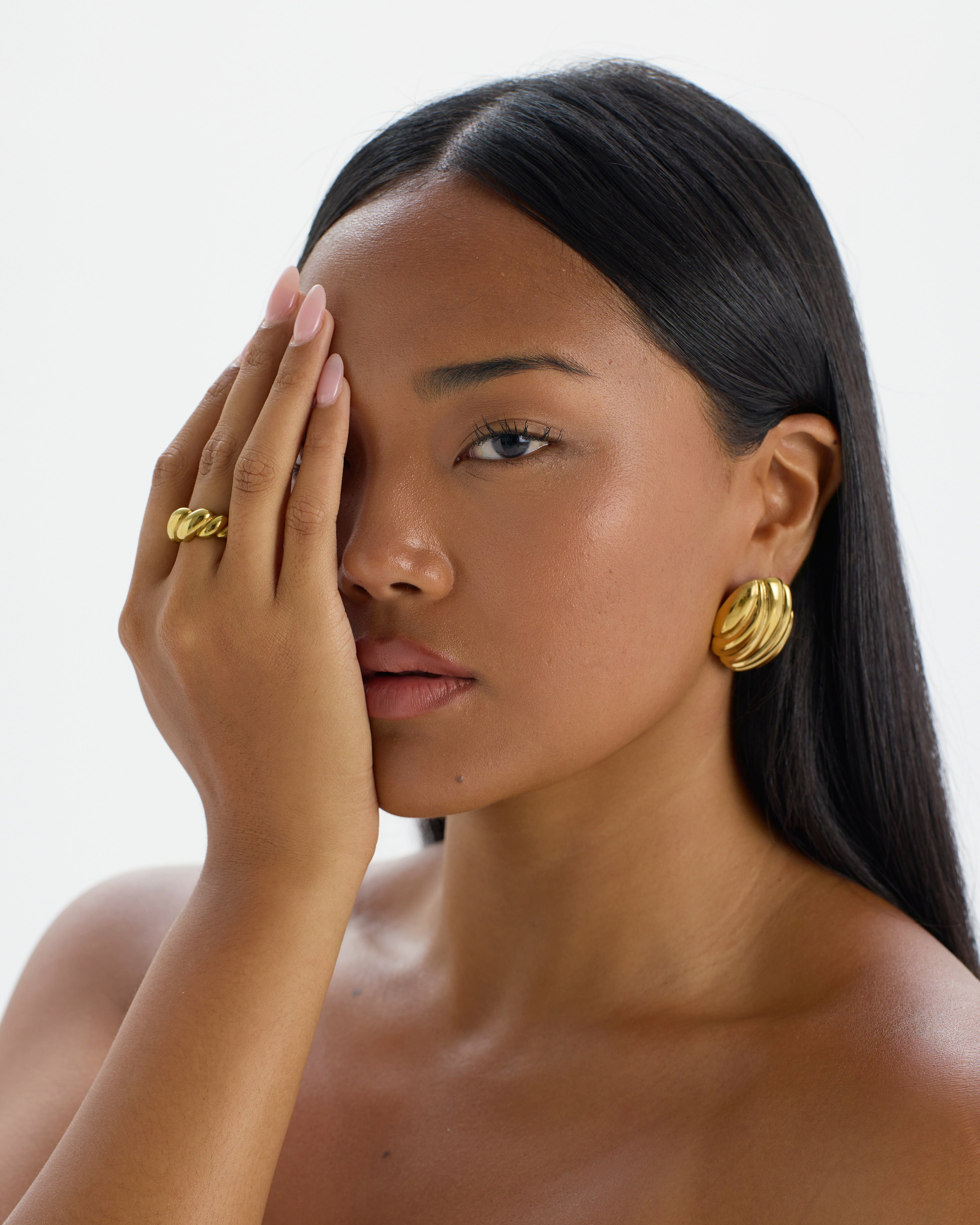 Statement 18K gold-plated textured oval stud earrings with croissant detailing