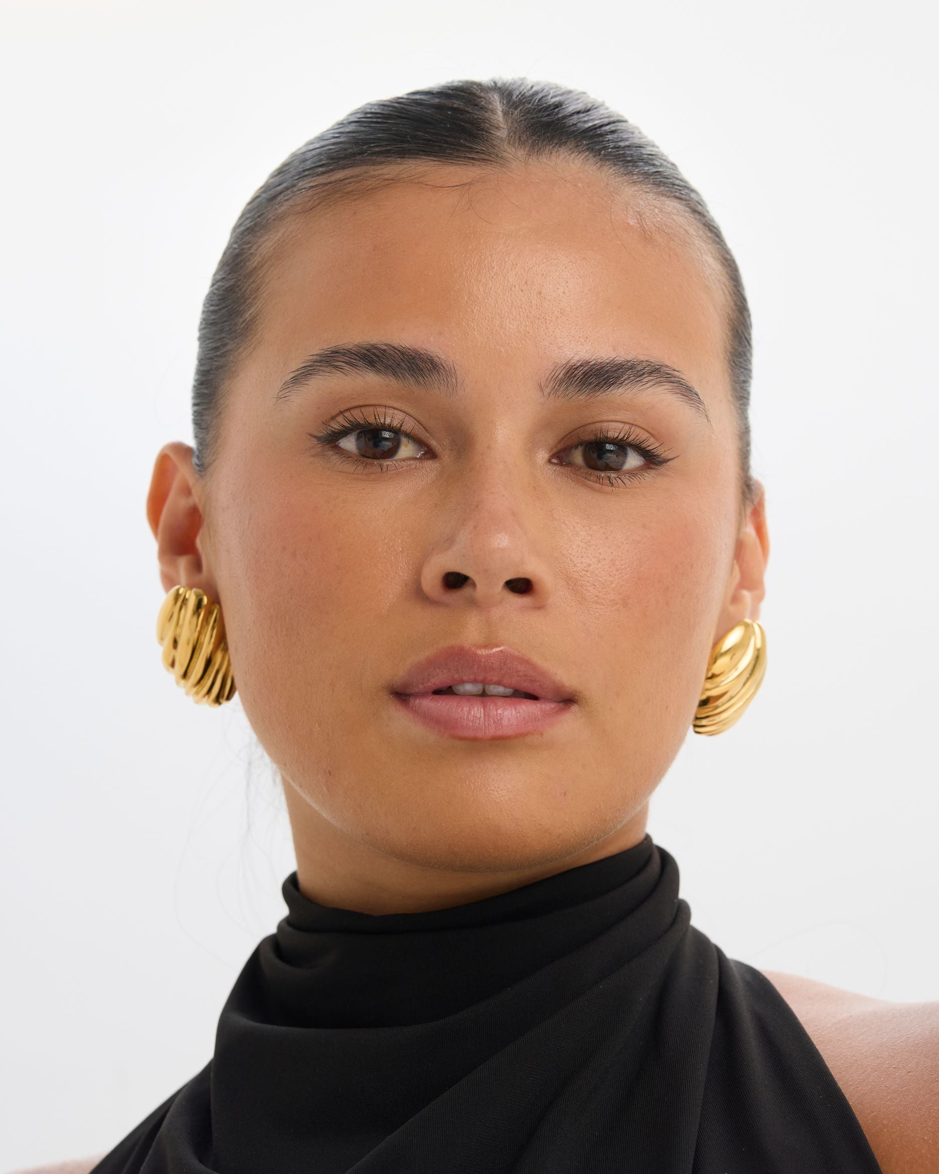 Statement 18K gold-plated textured oval stud earrings with croissant detailing