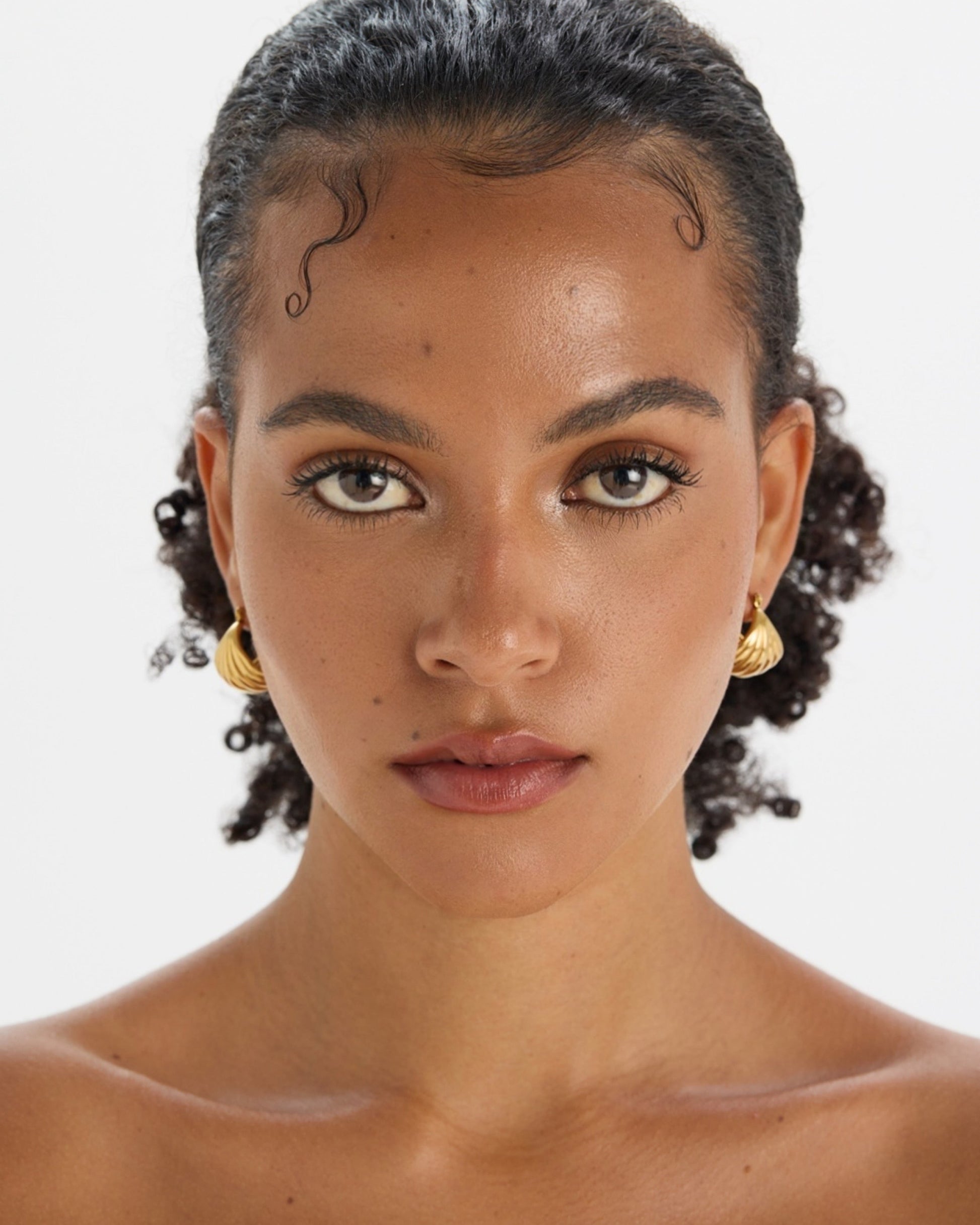 Minimalist staple 18K gold-plated textured crescent hoop earrings